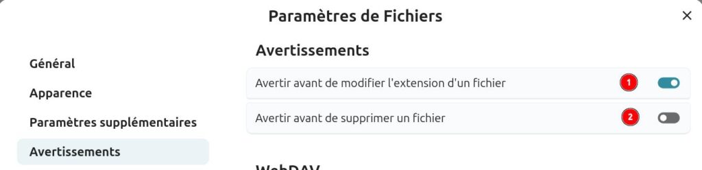 Interface des paramètres de fichiers dans Nextcloud, onglet 'Avertissements' sélectionné. À gauche, un menu latéral propose les sections : 'Général', 'Apparence', 'Paramètres supplémentaires', et 'Avertissements' (sélectionné).
À droite, les options disponibles pour les avertissements sont :
Avertir avant de modifier l’extension d’un fichier (bouton activé),
Avertir avant de supprimer un fichier (bouton désactivé).