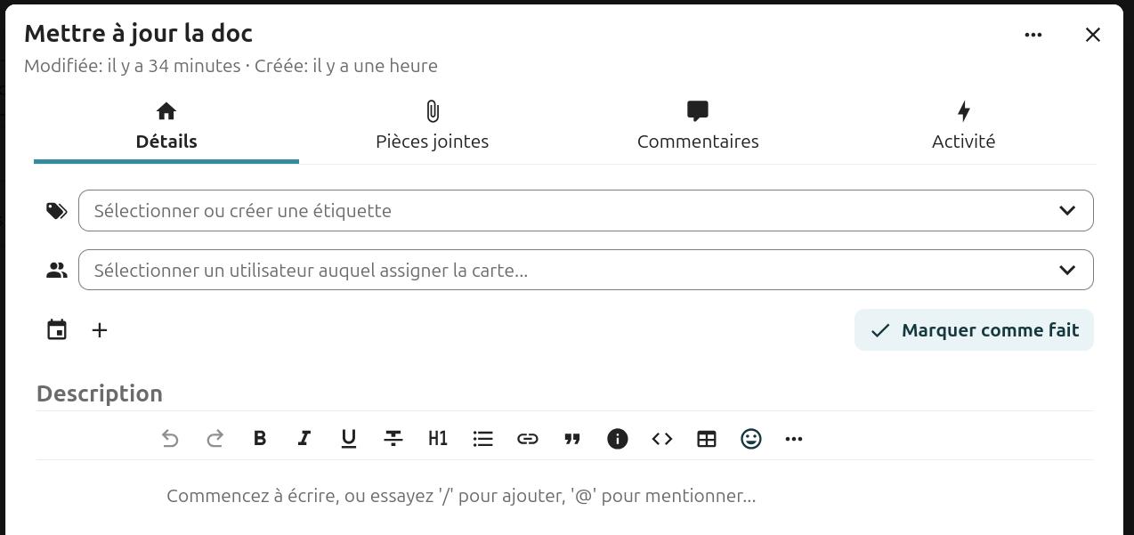 Capture d'écran de la popup des détails de la carte. On y voit le titre de la carte, ainsi que 4 onglets, "Détails" (c'est cet onglet qui est ouvert), "Pièces jointes", "Commentaires", et "Activité".